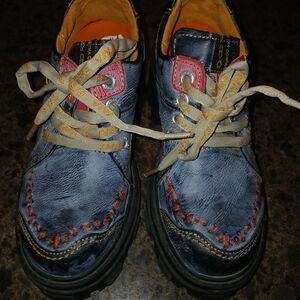 Trendy Blue Sneakers with Orange and Pink Details